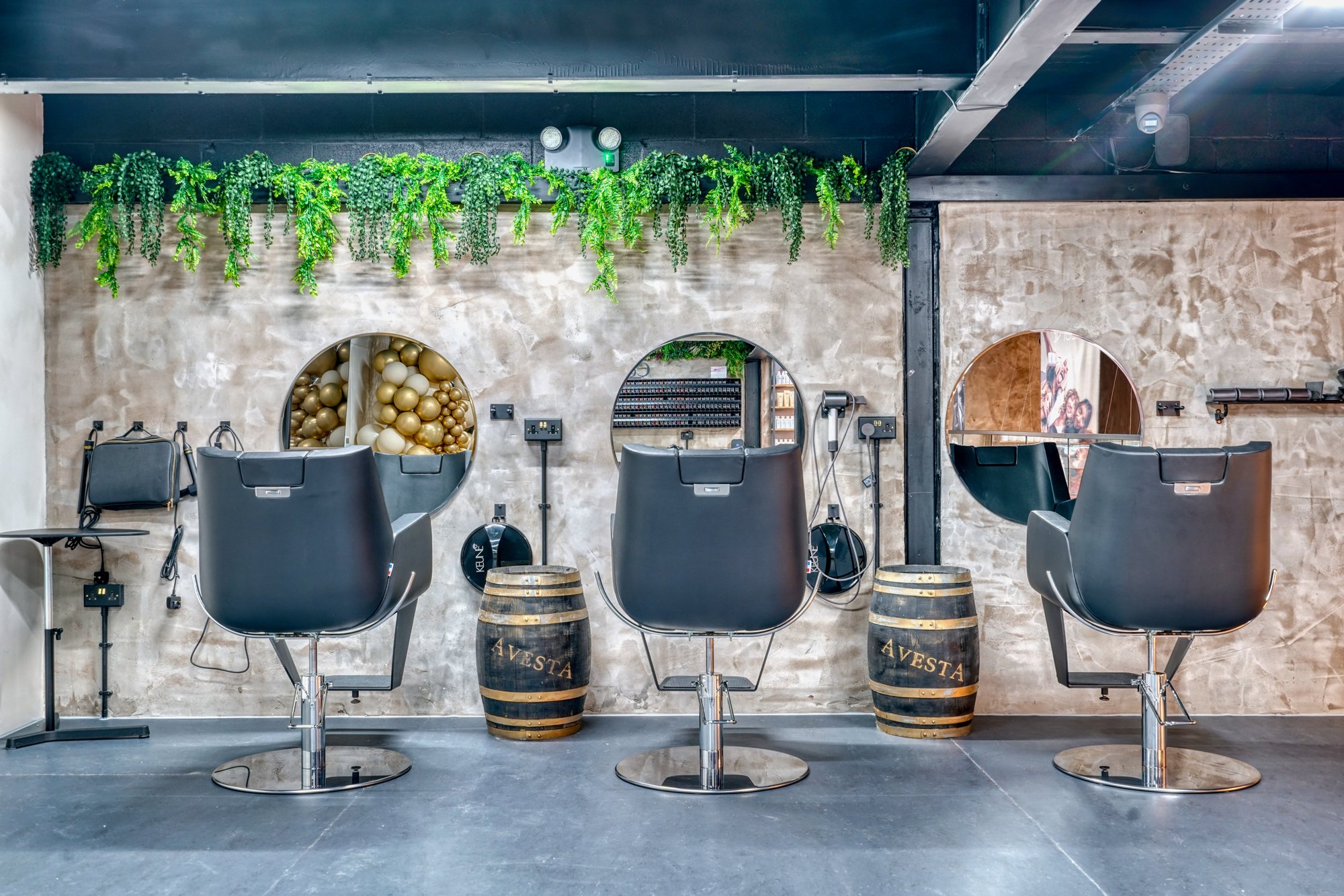 Styling chairs with circular mirrors at Avesta Hair Academy, Salford